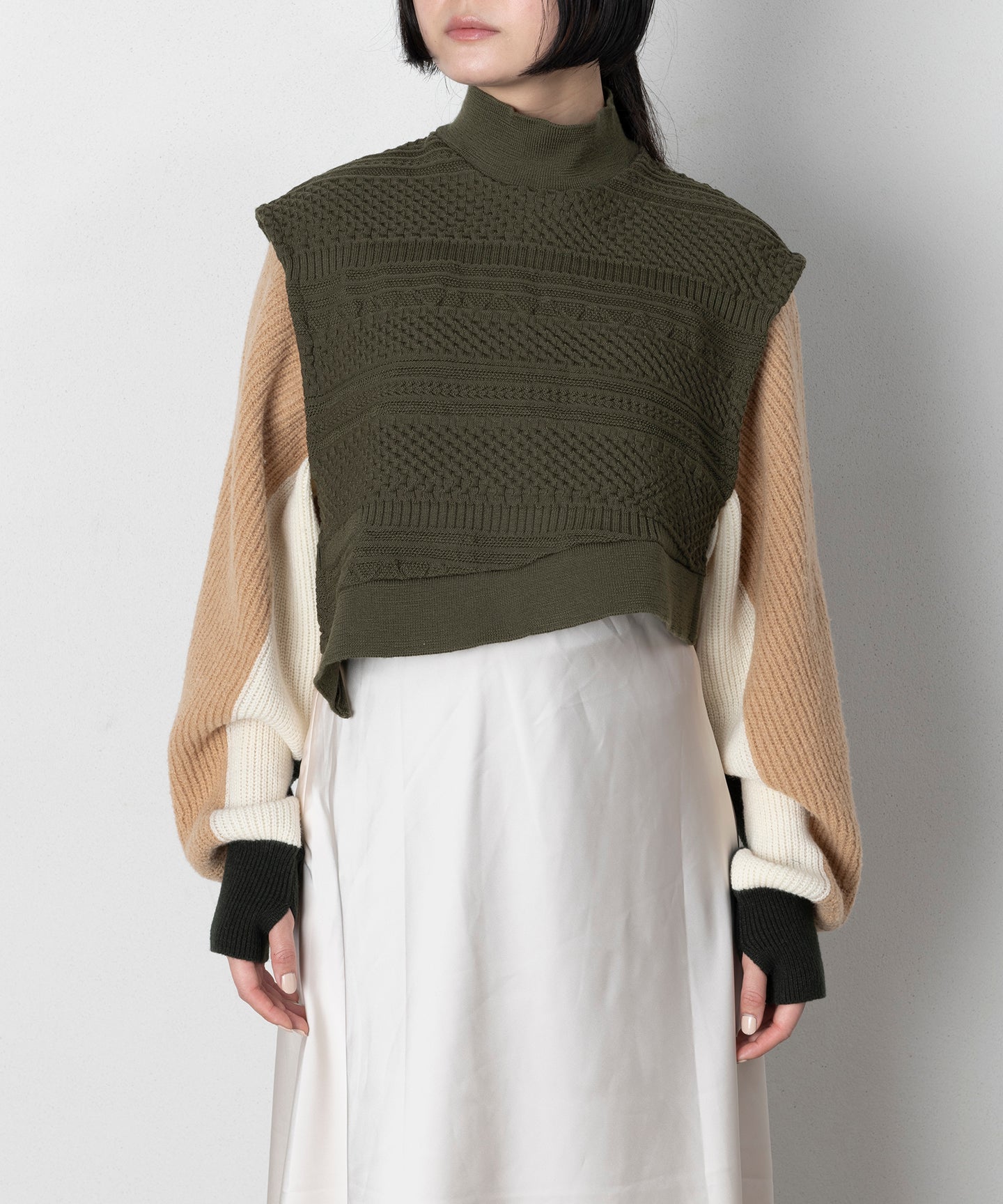 BUMPY SWITCH KNIT VEST